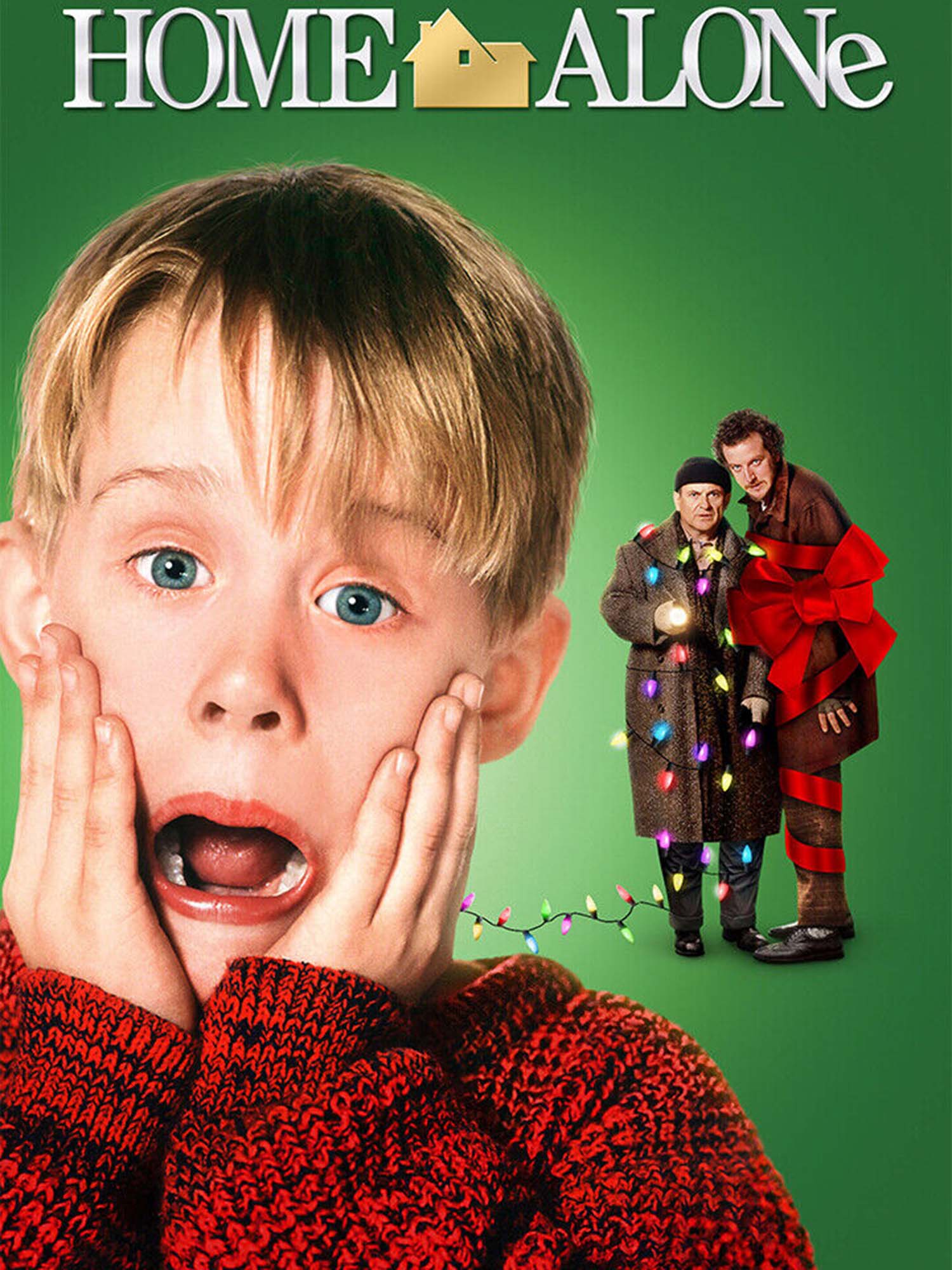 Photo: The movie poster for "Home Alone" featuring a little boy with blonde hair placing his hands on the sides of his mouth and looking scared. There are two older men behind him that are wrapped up in holiday lights and ribbon, respectively
