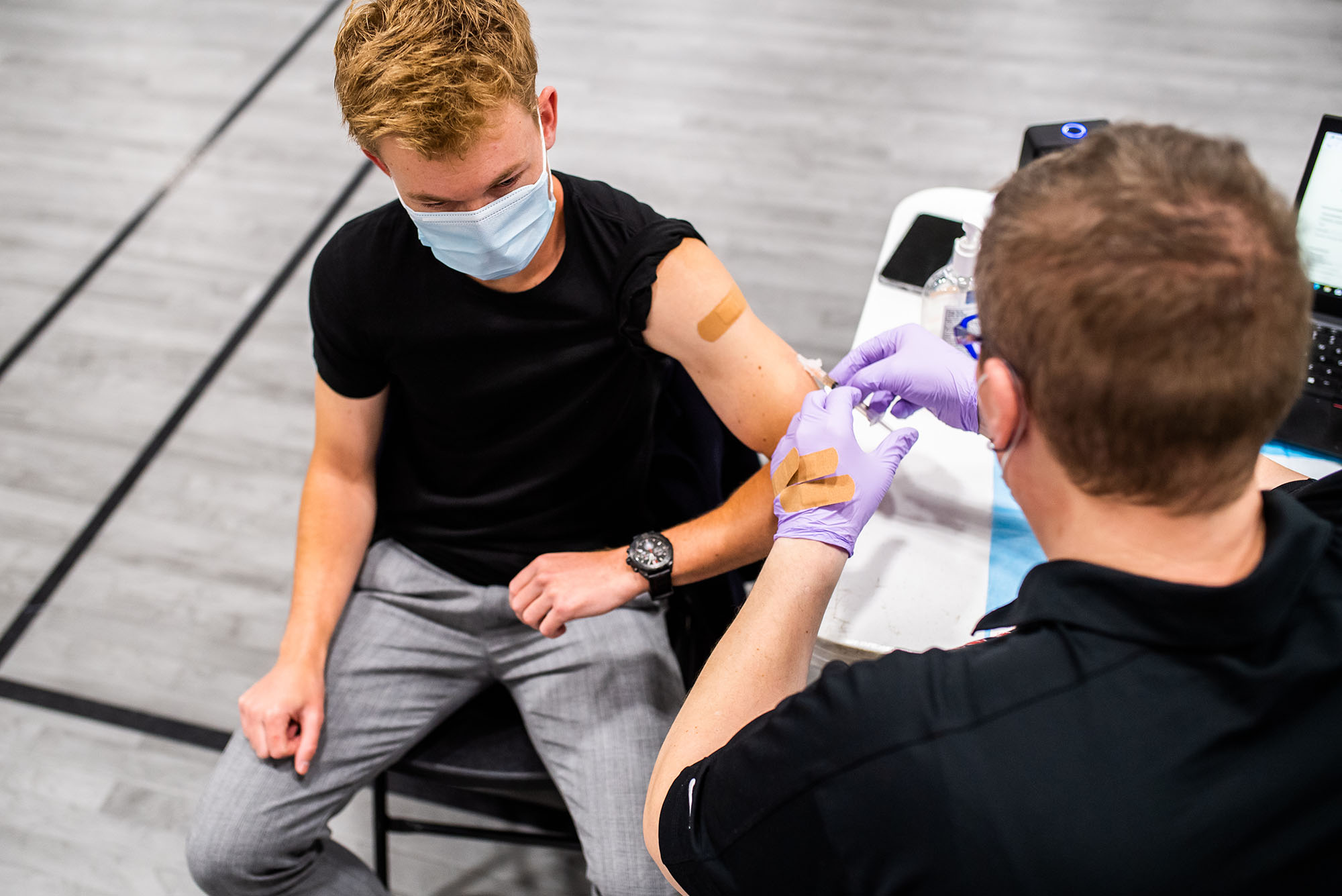 Photo: A person getting a vaccine at an immunization clinic