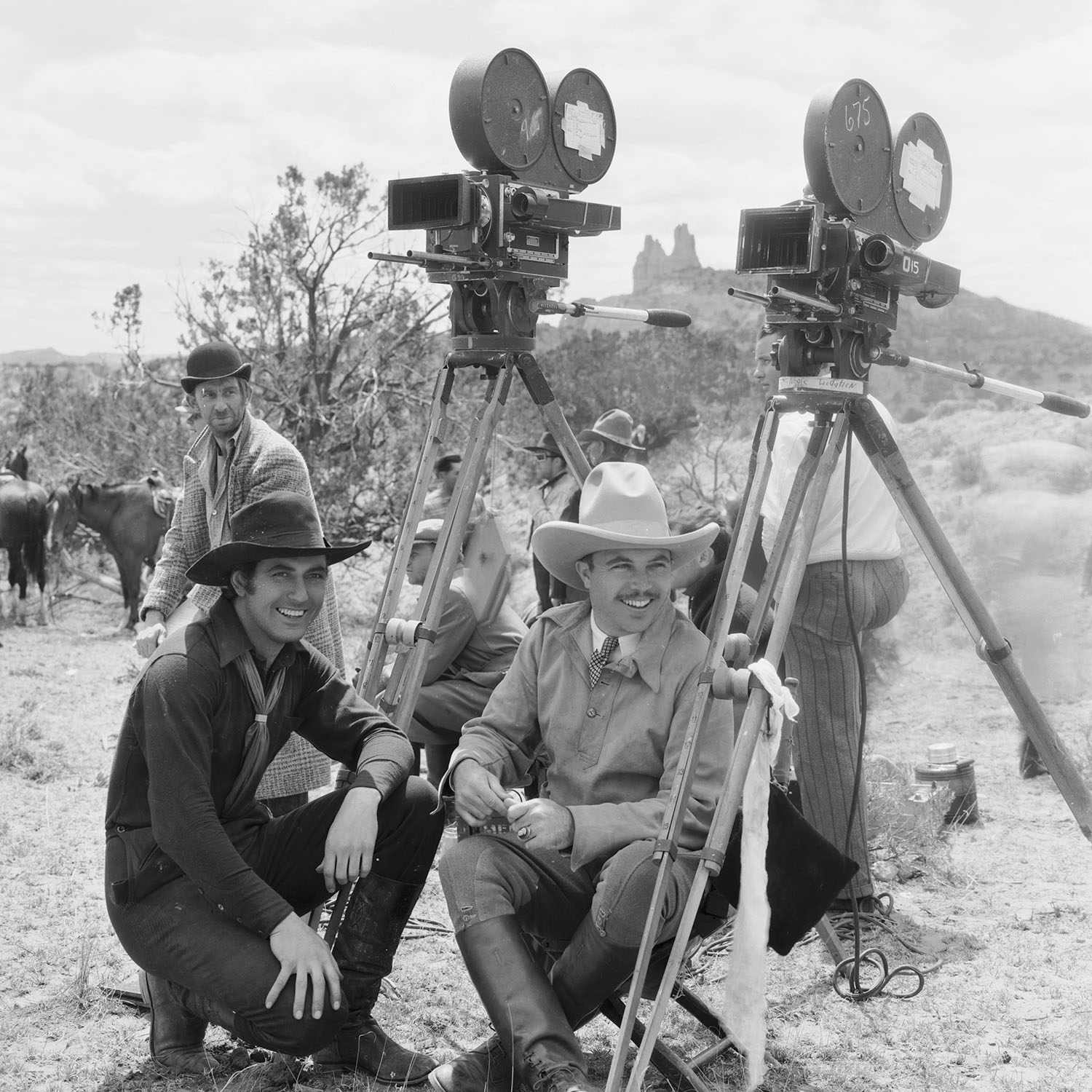 Photo: A black-and-white picture of King Vidor (right) and Johnny Mack Brown on the set of Billy the Kid