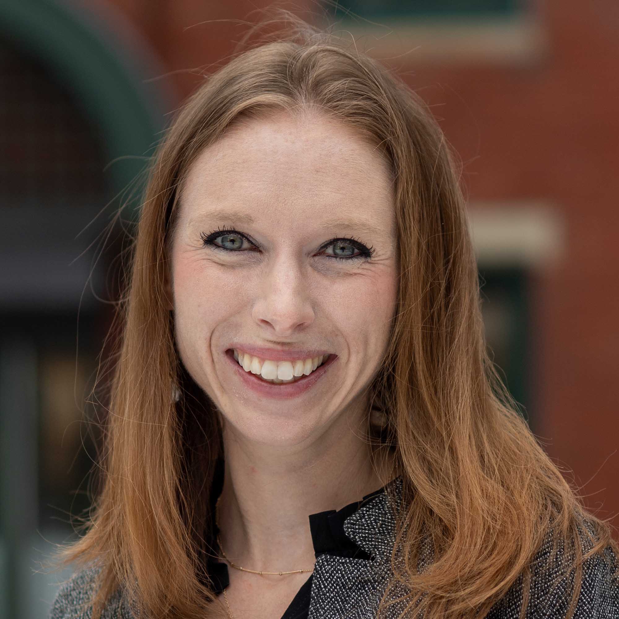 Photo: Medicaid Policy Lab co-director Megan Cole Brahim, a white women with short, shoulder length hair.