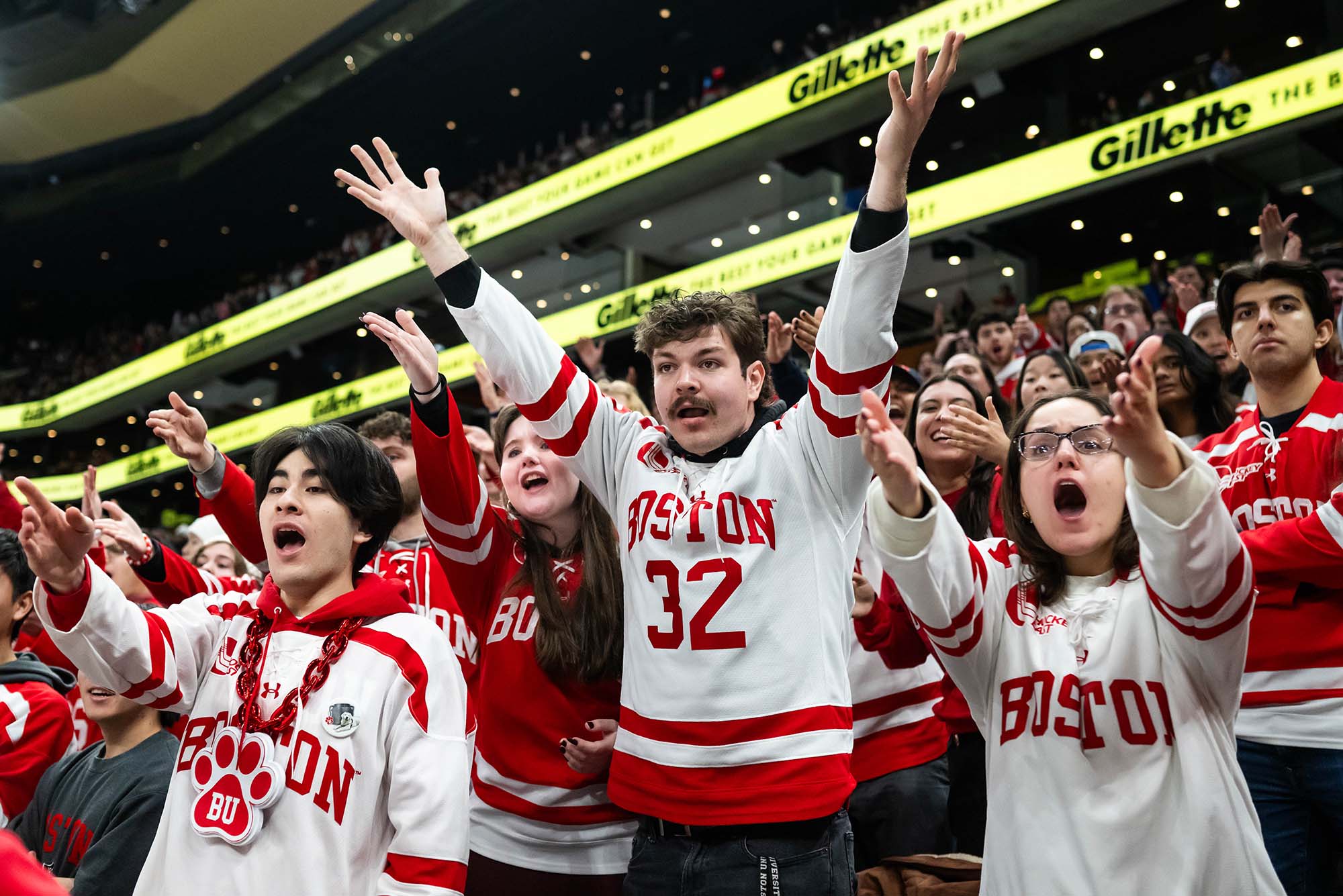 Photo: Fans react with hands up and sullen faces as BU takes on Northeastern during the 46th Women’s Beanpot Championship