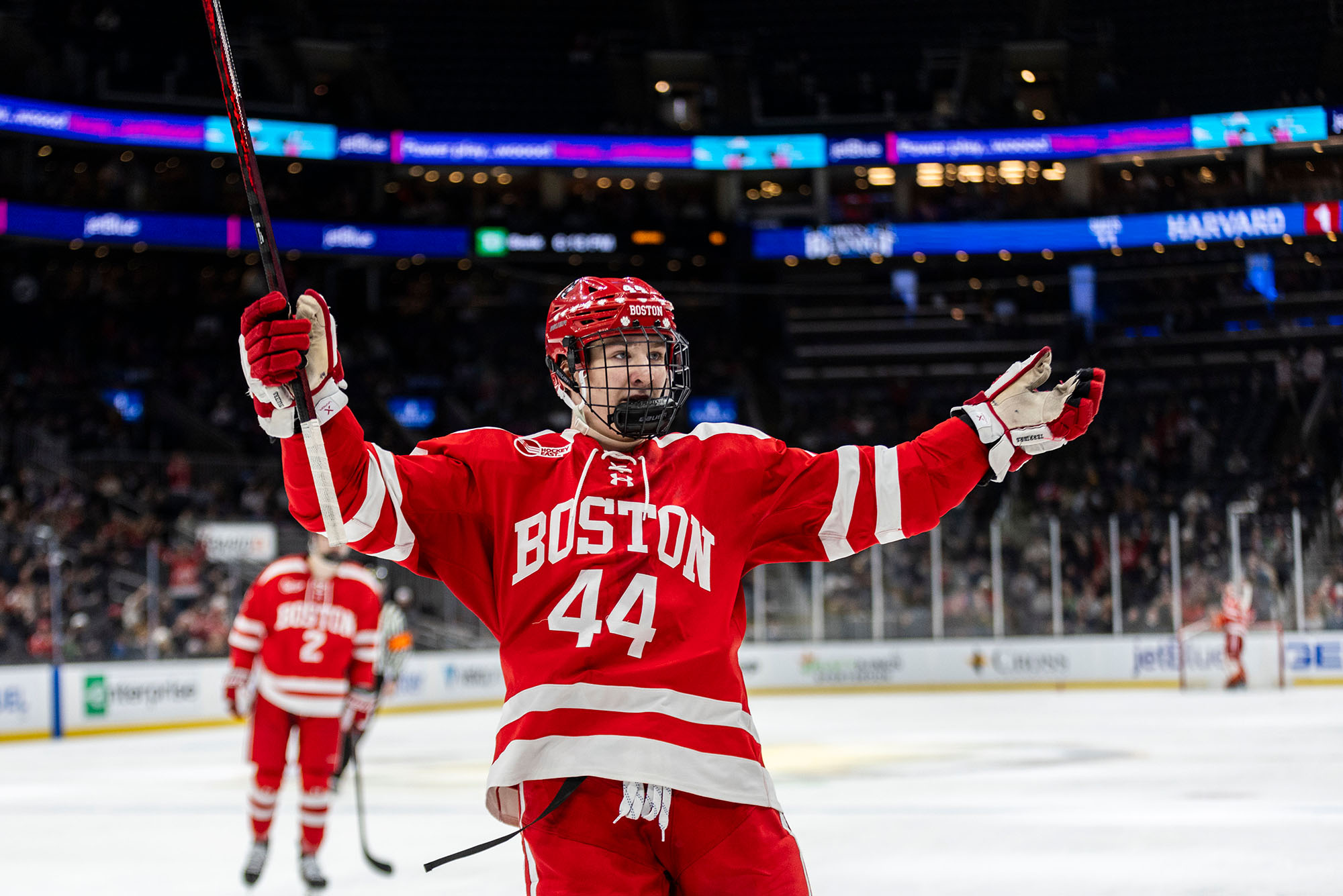 Photo: A closeup of a Boston University hockey player celebrating on the ice after scoring a goal