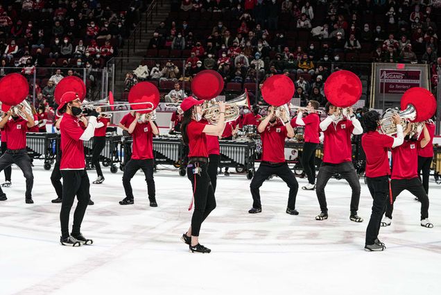 Photo: BU Bands performing on Ice during a BU men's hockey game