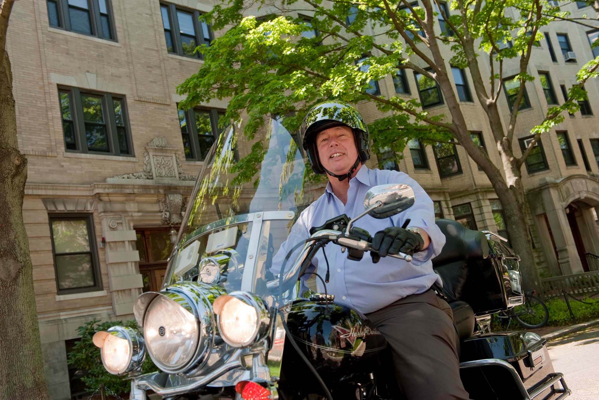 Photo: A man on a motorcycle on Commonwealth Avenue in Boston