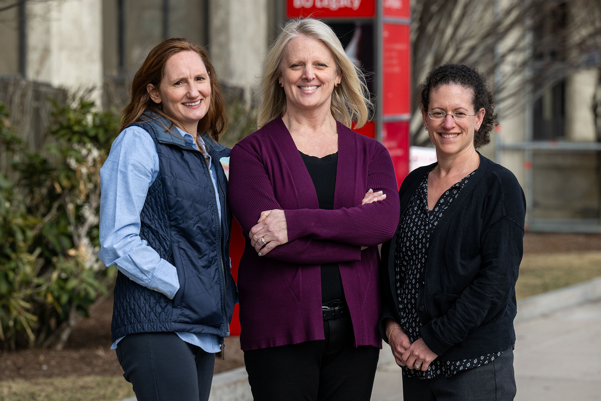 Photo: Three women standing on Commonwealth Ave posing and smiling