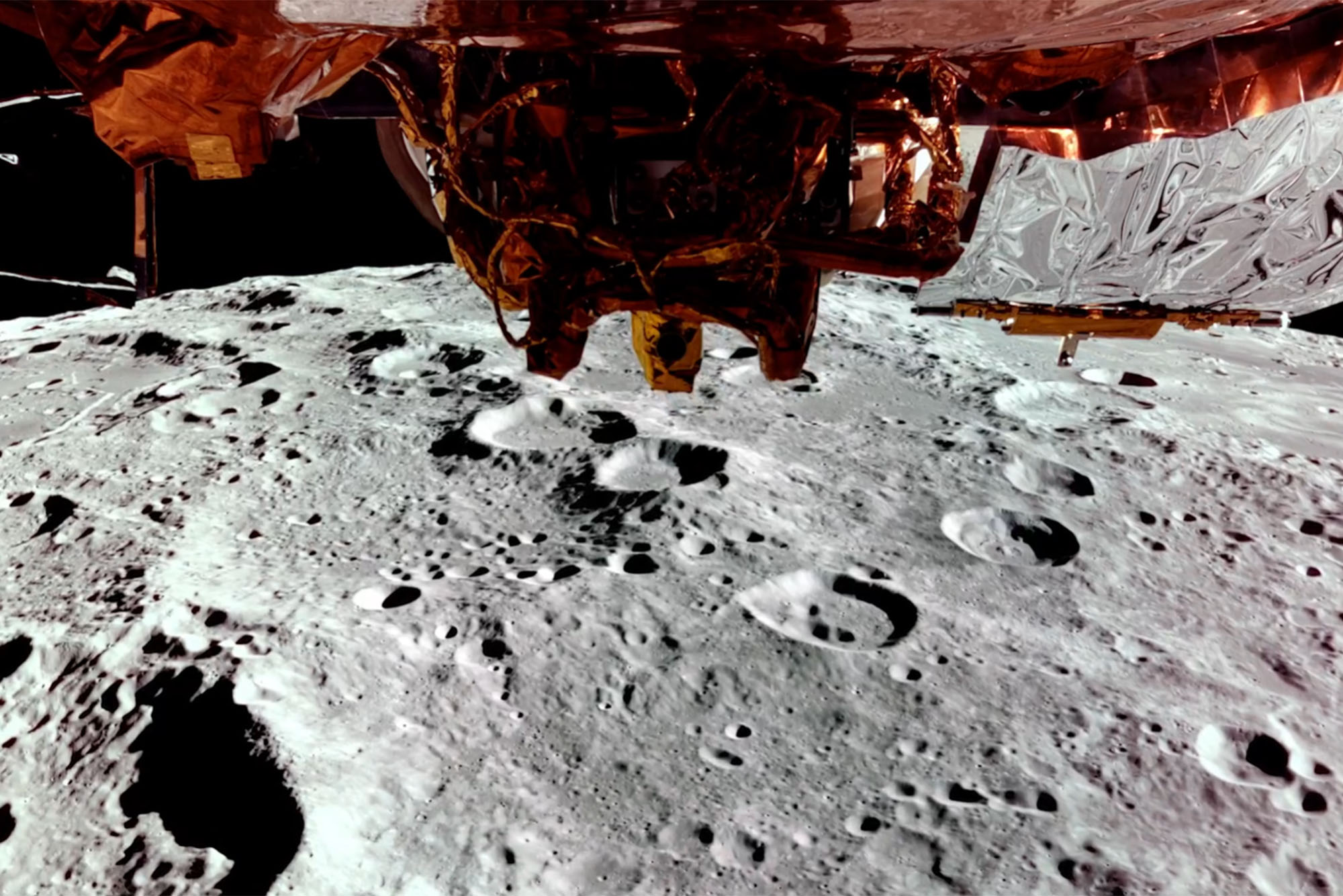Image of the moon with a spacecraft visible in the foreground