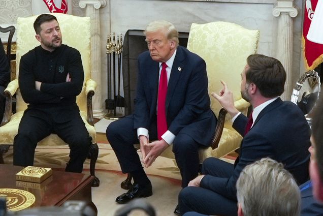 Vice President JD Vance, right, speaks with Ukrainian President Volodymyr Zelenskyy, left, as President Donald Trump, center, listens in the Oval Office at the White House, Friday, Feb. 28, 2025, in Washington. (AP Photo/ Mystyslav Chernov)