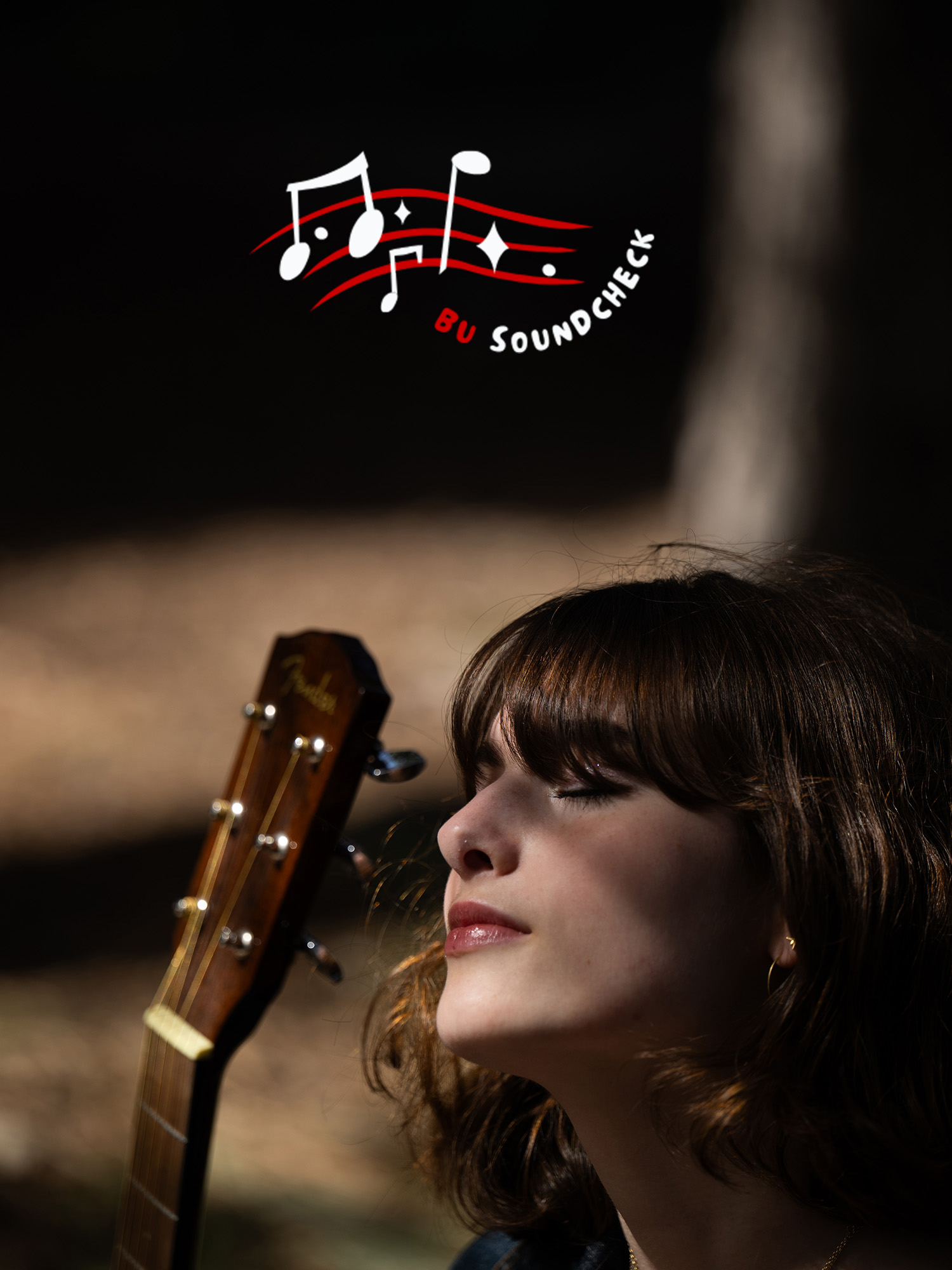 Photo: A girl holding a guitar outside with her eyes shut as the sun casts shadows on her face. There is a red white logo with music notes and the words "BU Soundcheck" over the image