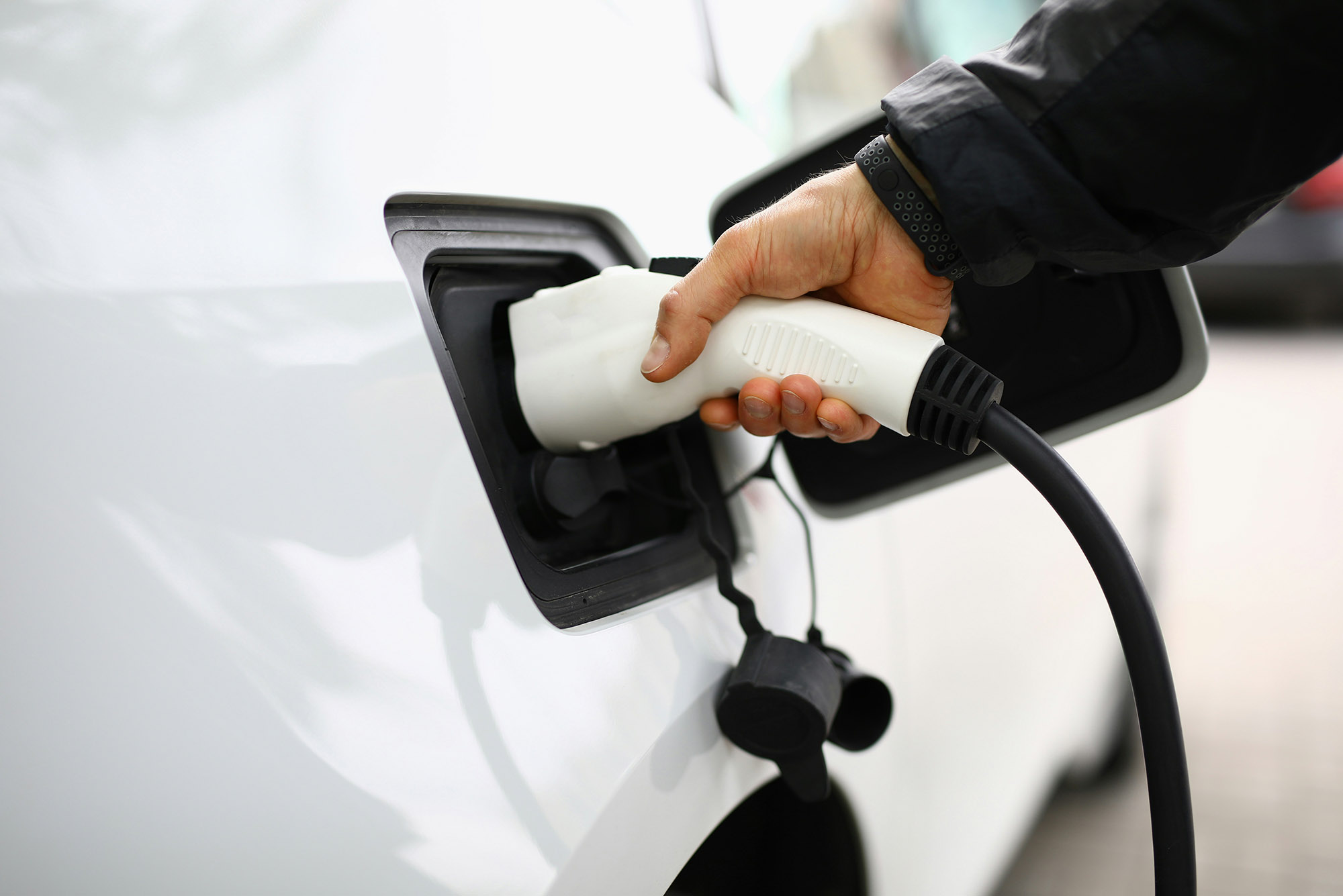 Photo: A stock image of a car being charged.
