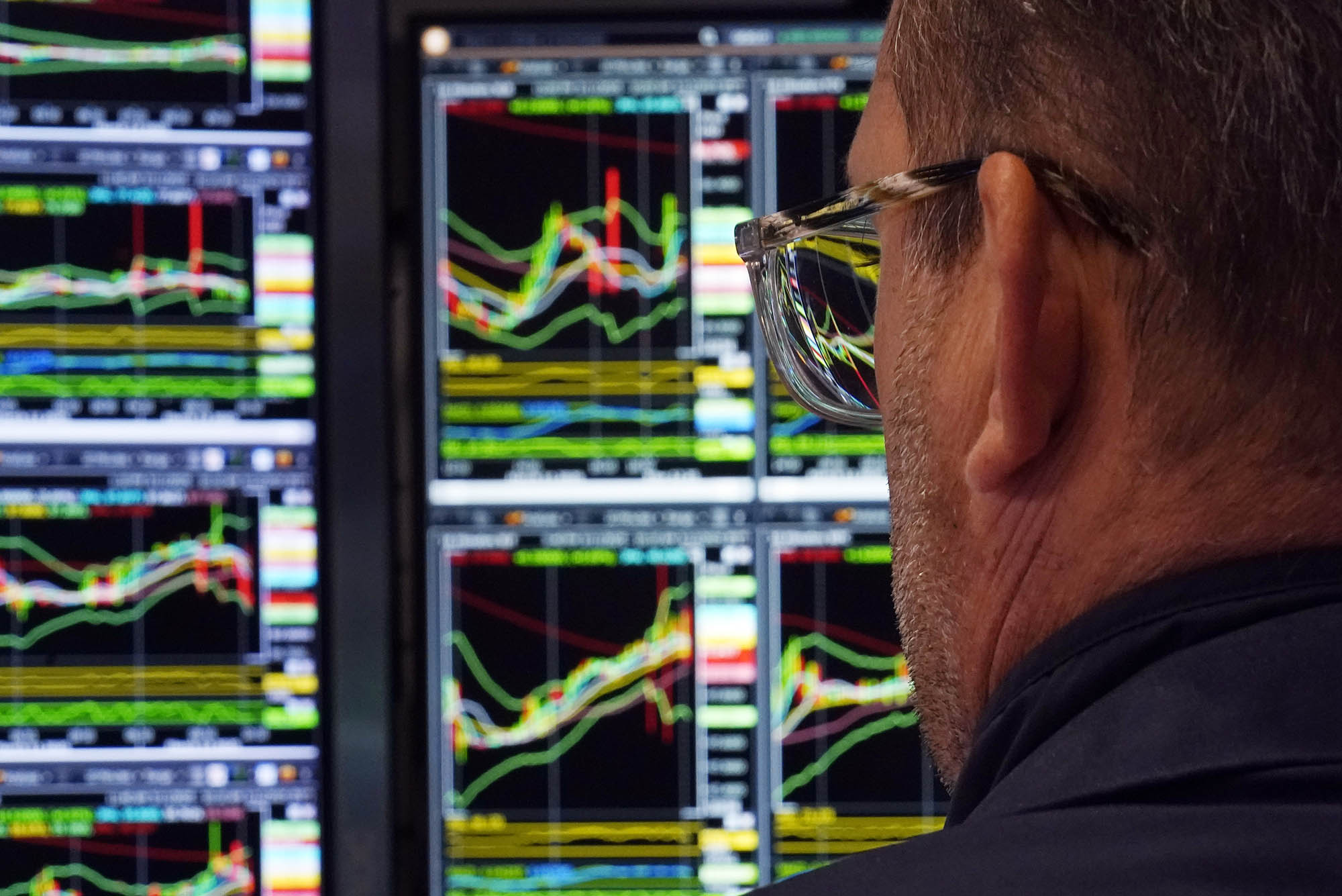 Photo: A specialist works at his post on the floor of the New York Stock Exchange