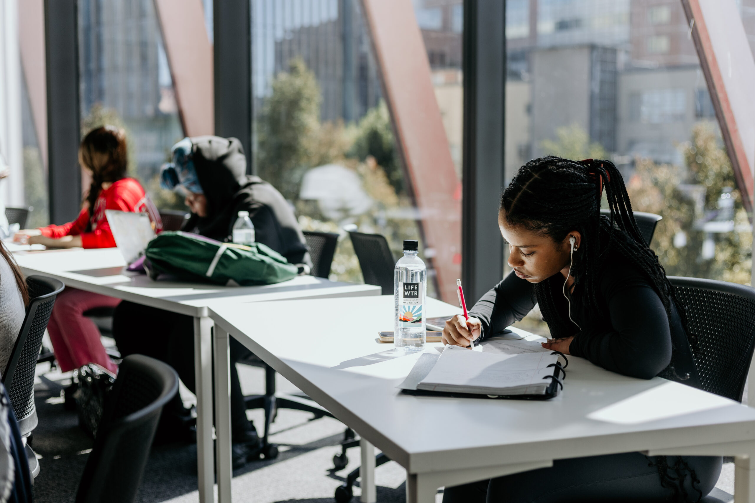 Students studying at tables