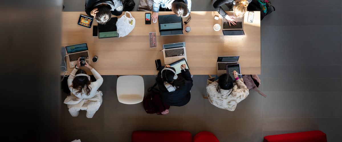 Students studying at table in Computing and Data Science Building