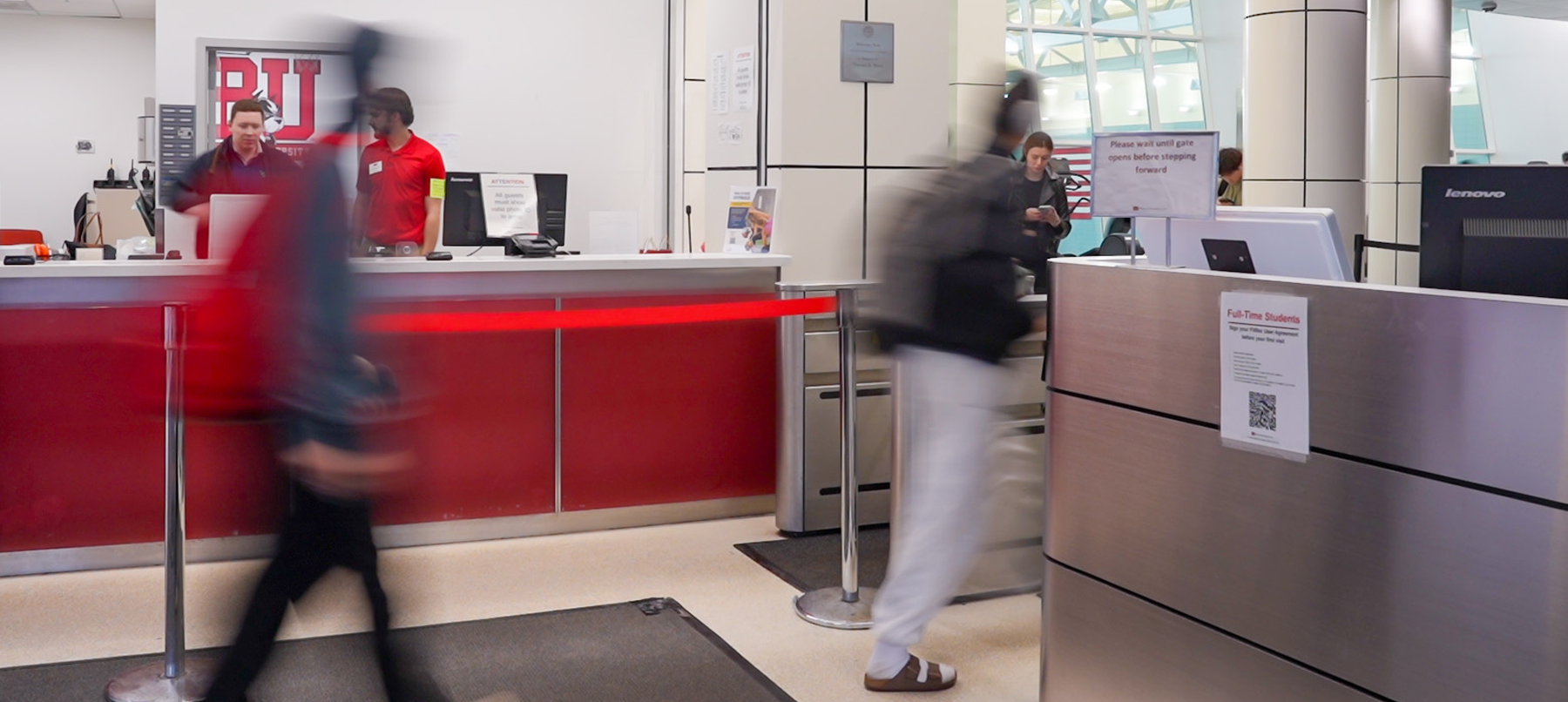 FitRec members going through the turnstiles