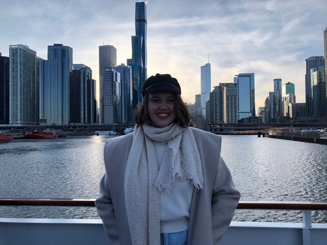 Adriane Vigna in front of city skyline