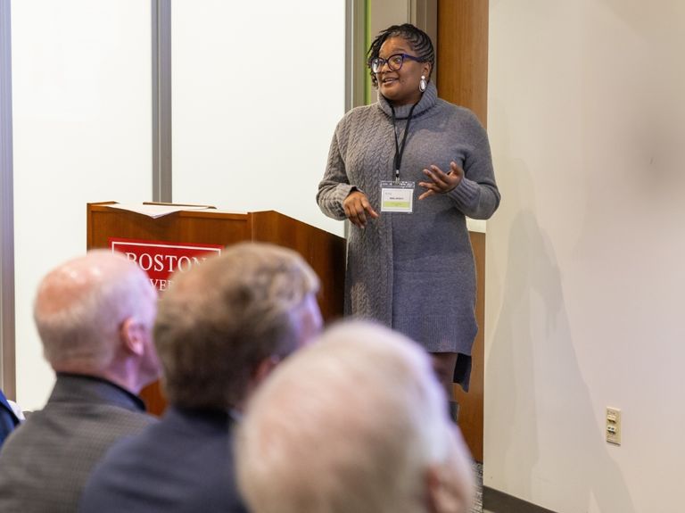 A professional talking to an audience.