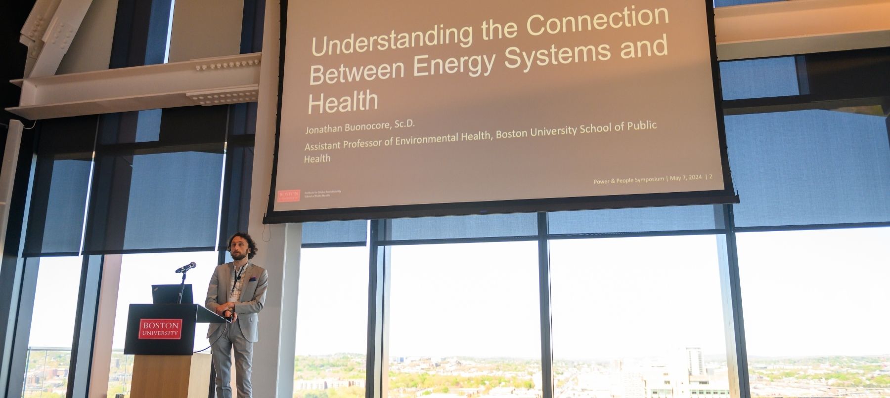 Jonathan Buoncocare gives a presentation on energy systems and health.