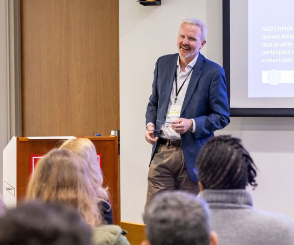 A professional speaking to an audience.