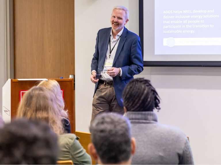 A professional speaking to an audience.