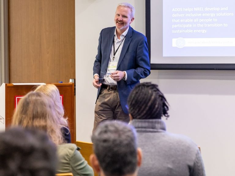 A professional giving a lecture presentation.