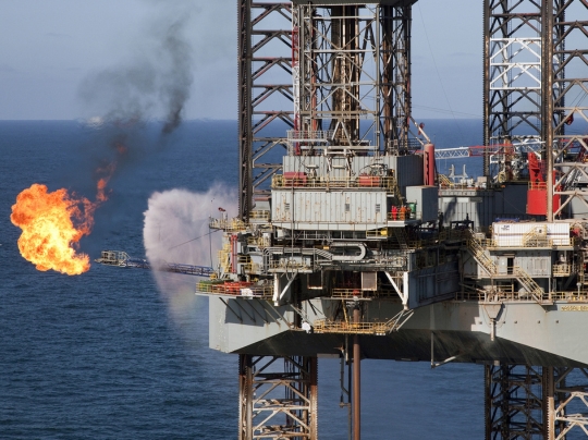 Oil machinery and fire explosion in open ocean.