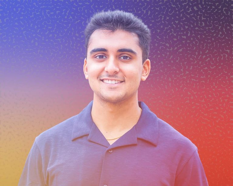 A young man smiling