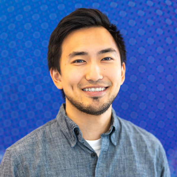 Jonathan smiling for headshot