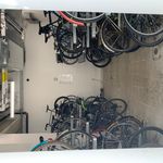 Inside bicycle security storage room at Kilachand Center
