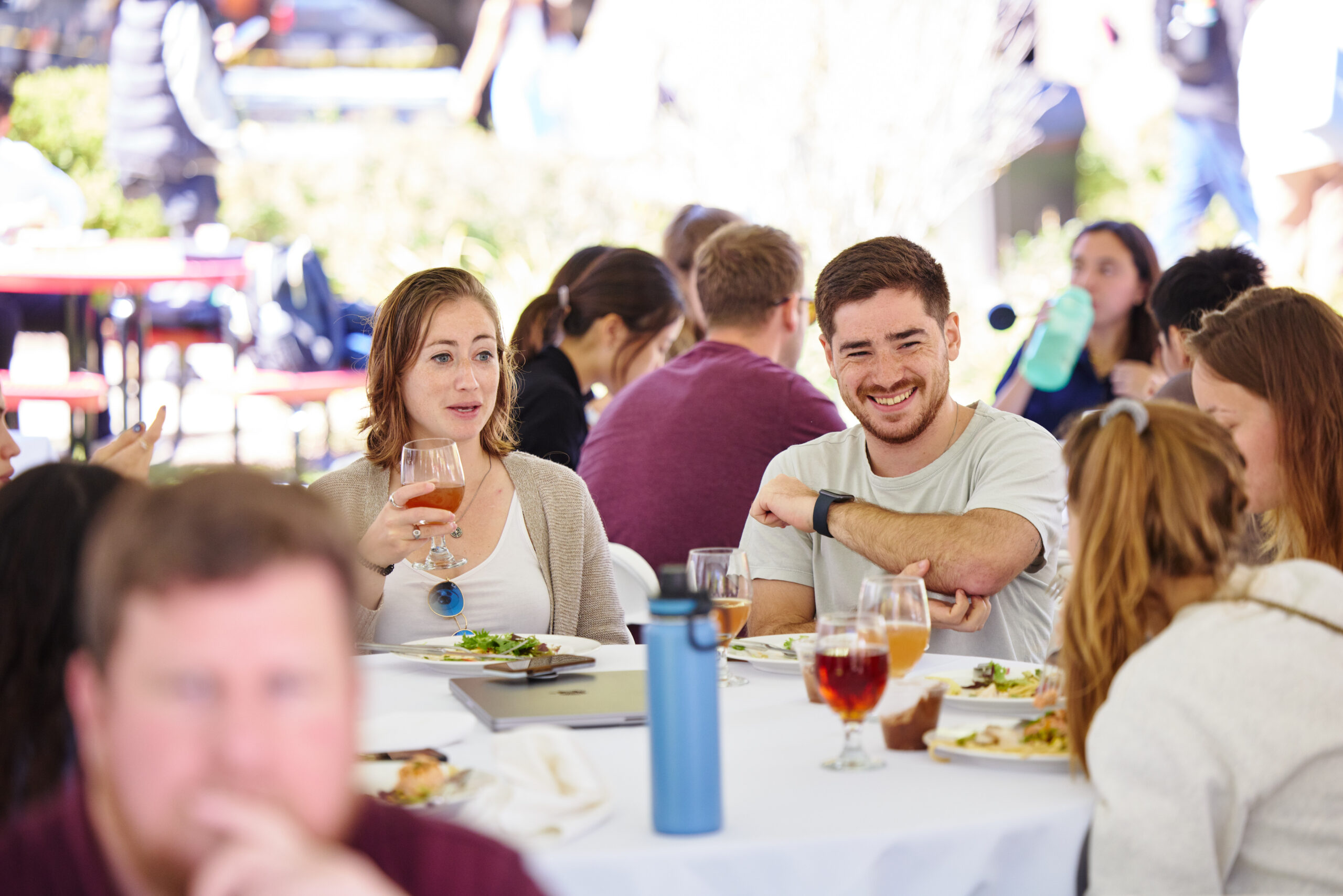 People at outdoor lunch reception during Kilachand Day event