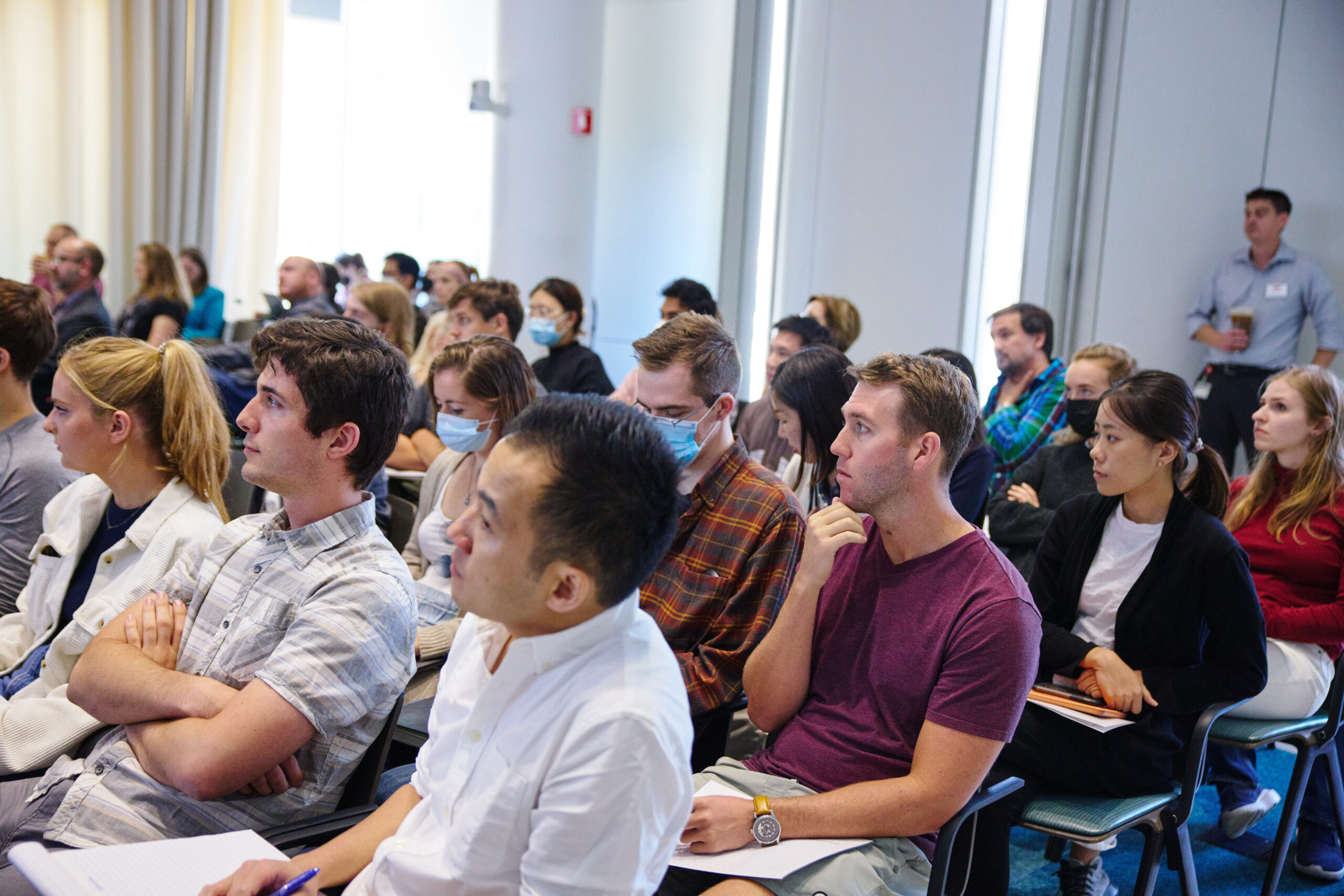 Audience members in colloquium room