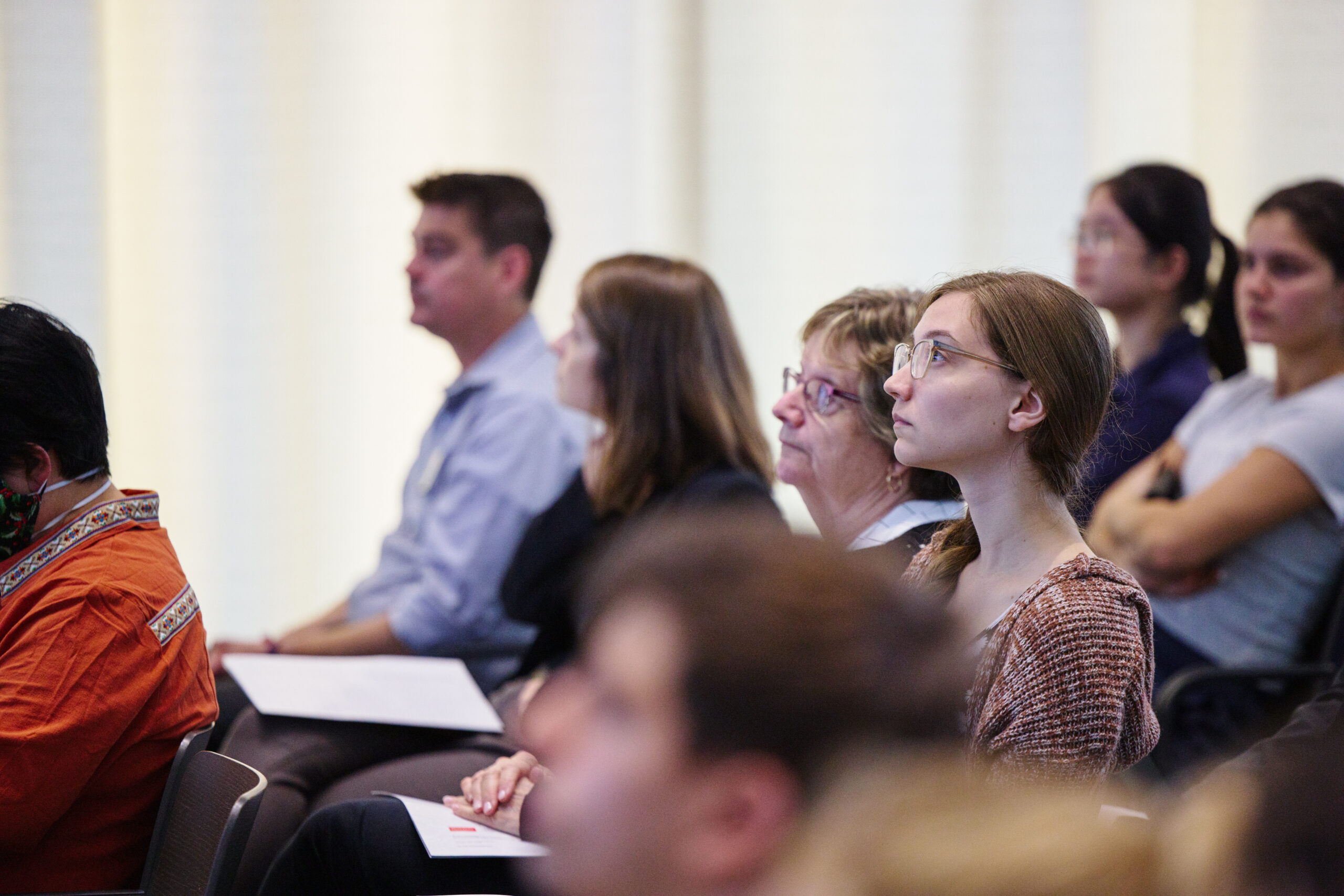 Audience members in colloquium room