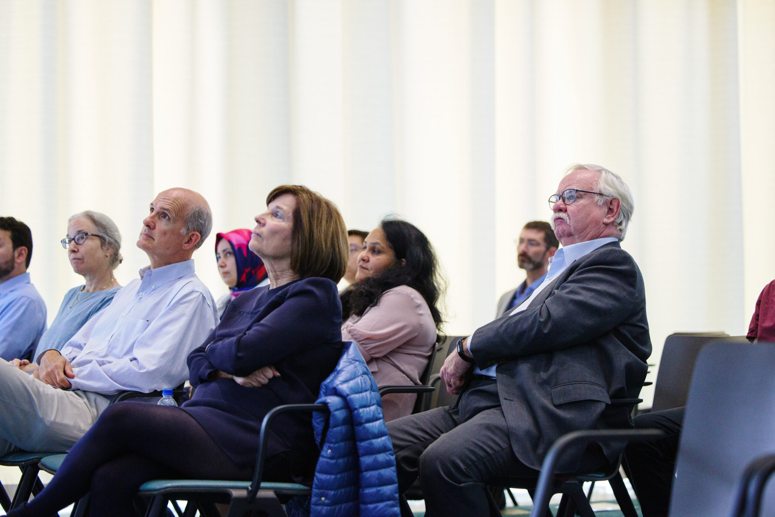 Audience members in colloquium room