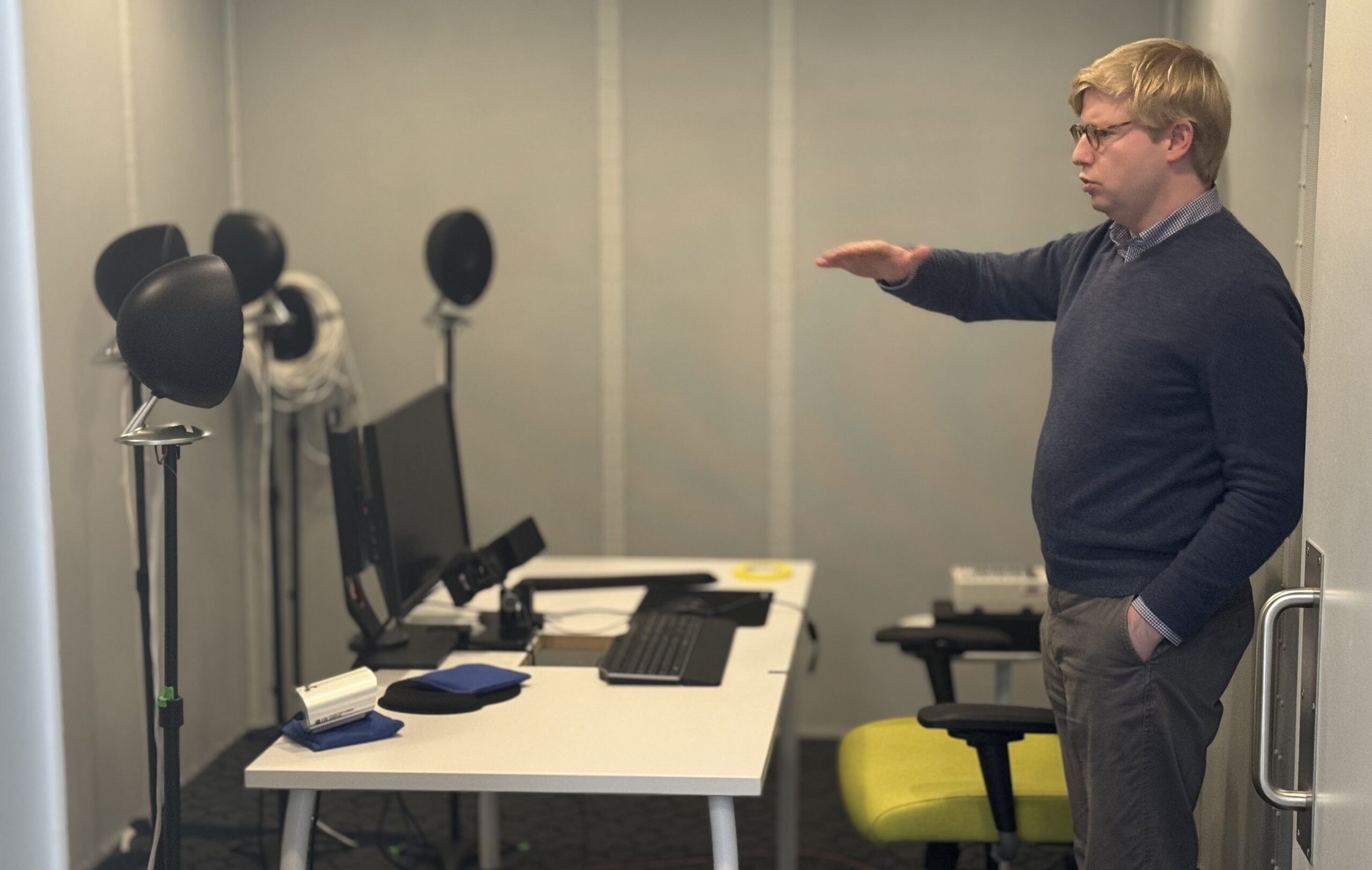 person standing in a sound booth