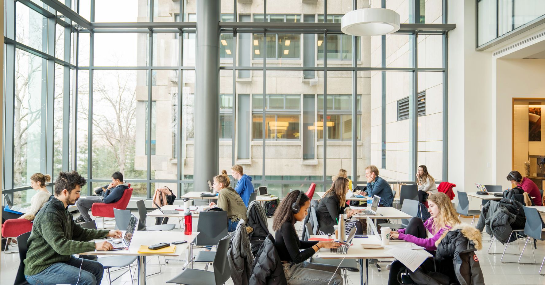 Students studying in the law cafe, McCausland Commons, at BU School of Law