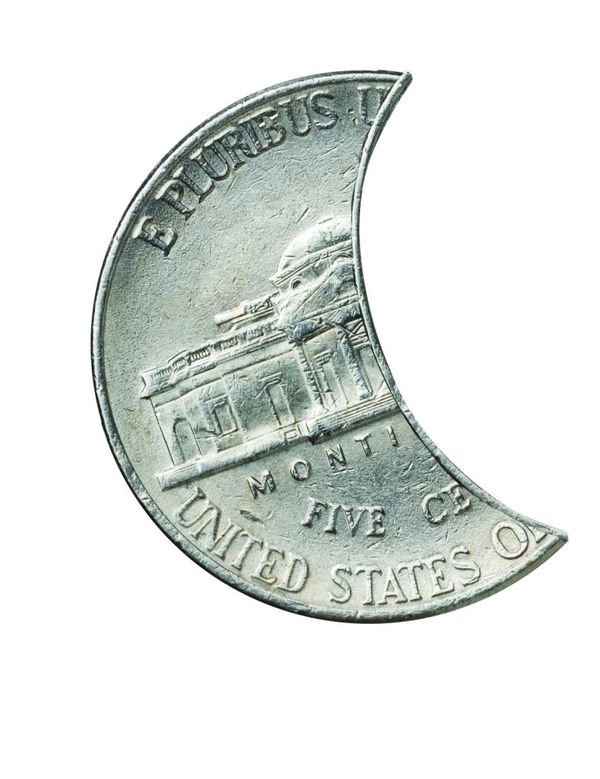 US nickel in the shape of a half moon