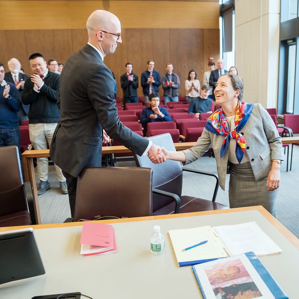 Ian Gillen (´19) and Alexandra Arnold (´19) shake hands after completing their oral arguments.