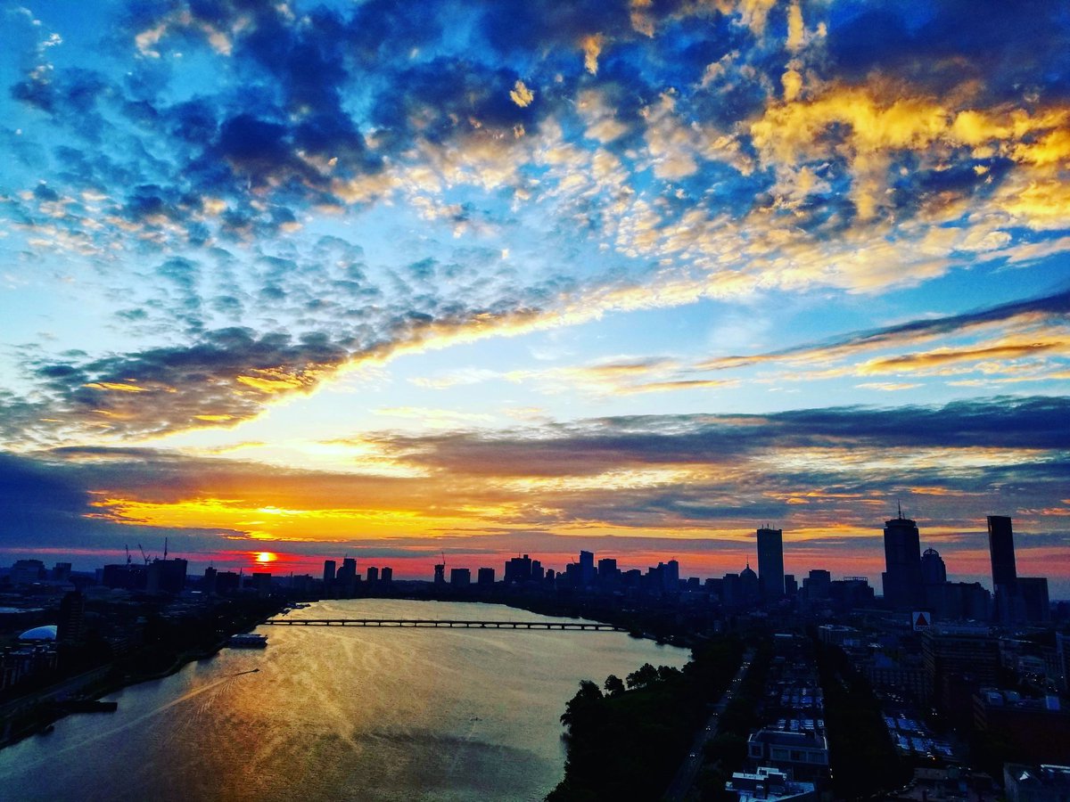 Sunrise over the Charles river with the Boston skyline