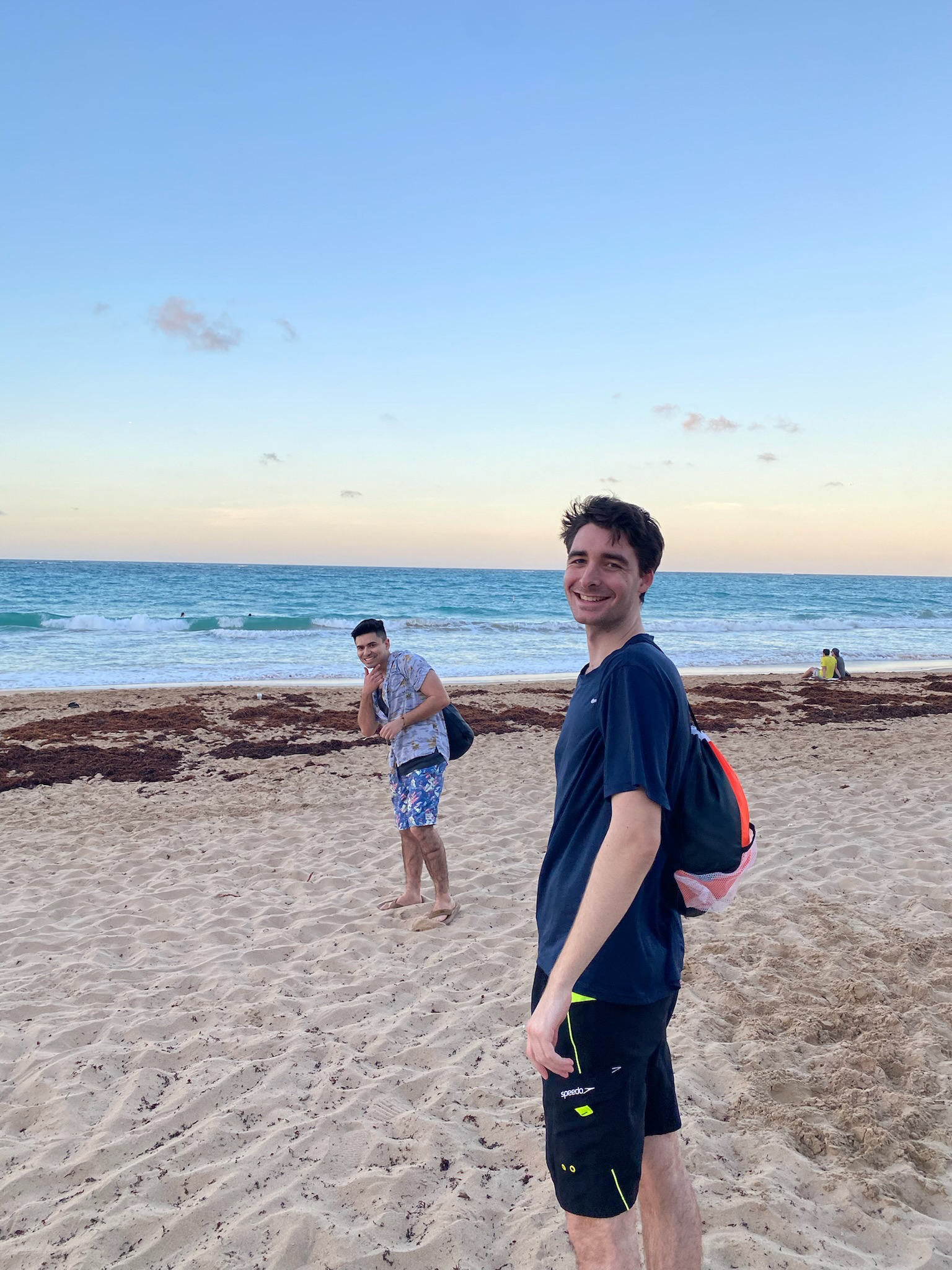 Matthew Ierardi (right) and Alejandro Perez (left) on a beach in Puerto Rico.
