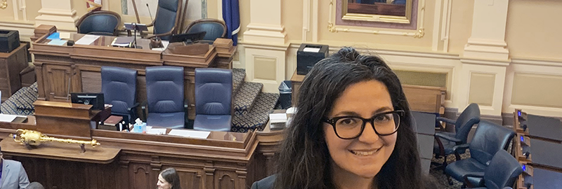 Gabrielle Goldstein standing in the Virginia State Capitol.