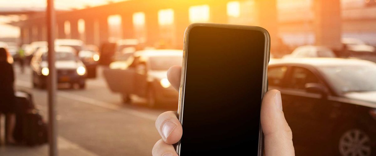 A person is waiting for a rideshare to show up.