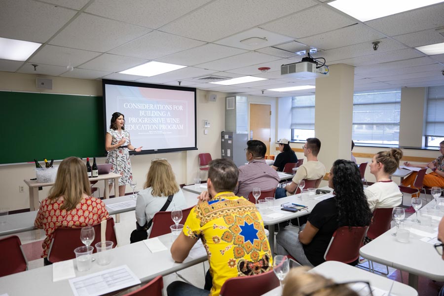 Gastronomy master’s candidate Marie-Louise Friedland makes a presentation titled "Considerations for Building a Progressive Wine Education Program"