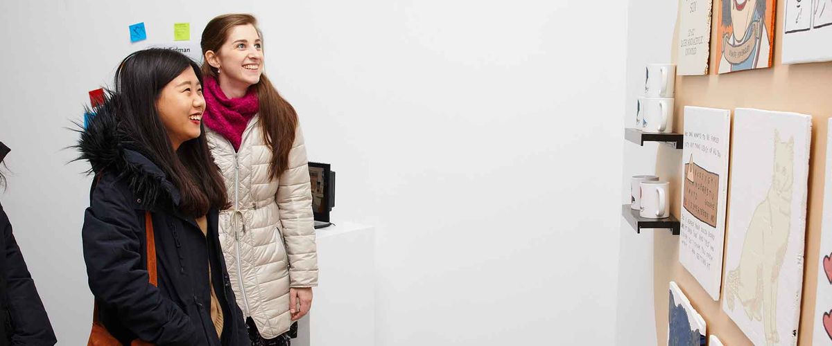 BU MET Arts Administration Students looking at artwork at the Boston Center for the Arts