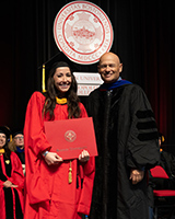 Chantal Barrett (MET'23) receives her degree from BU's MET College.