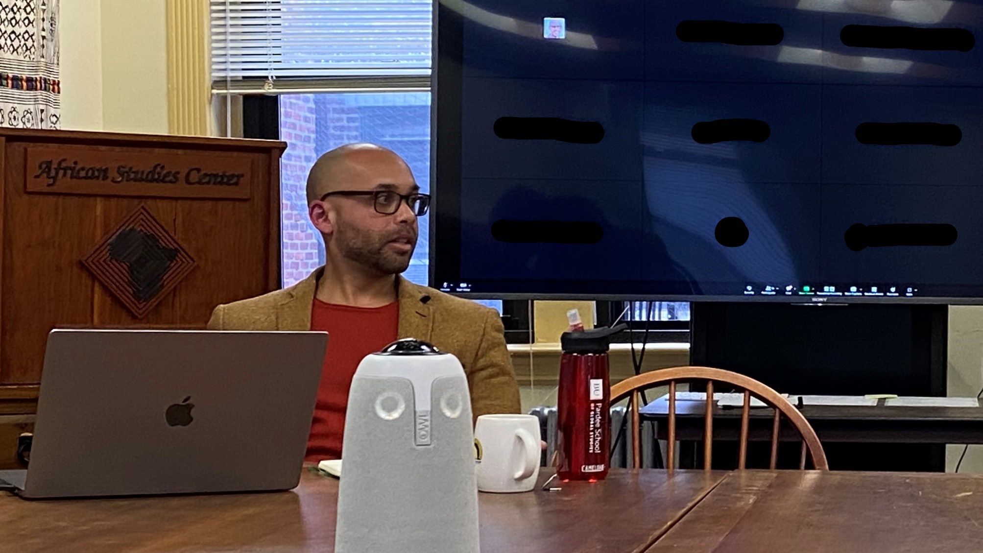 Professor Mondesire delivers a hybrid lecture from the BU African Studies Center
