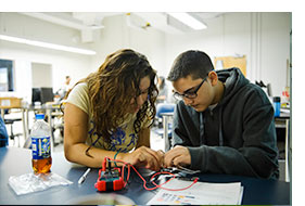 s13collab1 Upward Bound high school students from Chelsea, Brighton, and Charlestown learn to program and work with robots during a STEM outreach event with the help of 部 students and faculty at the Metcalf Science Center on February 19, 2013. Photo by Kalman Zabarsky