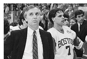 s13quinn1 大卫·奎因, right #7, stands next to Boston University men's hockey head coach, Jack Parker, after a 4-1 victory over BC during the 1986 Beanpot tournament at the Boston Garden. Photo by Boston University Photography