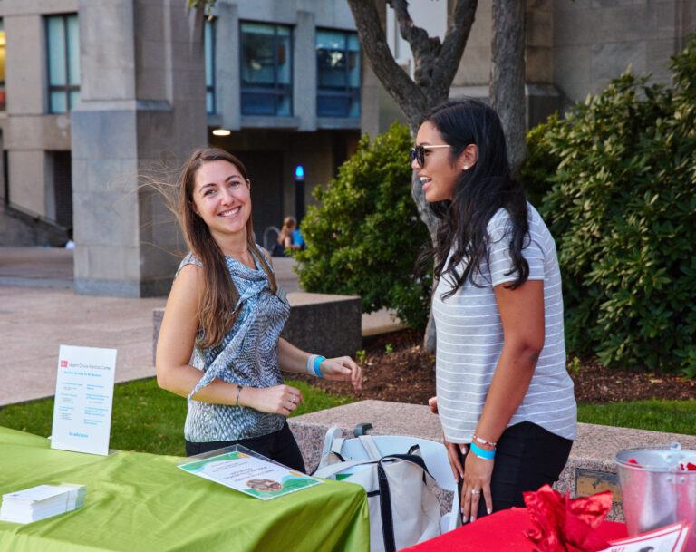 Admissions ambassadors walking on campus