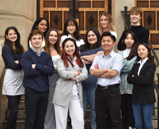 Ad Club Eboard posing on steps in business casual