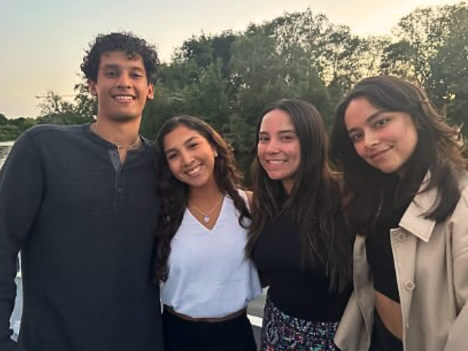 Four undergraduate students posing together for a photo