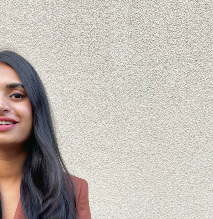 Student with brown skin, brown straight hair, and brown eyes, smiling, Urvashi Tripathi