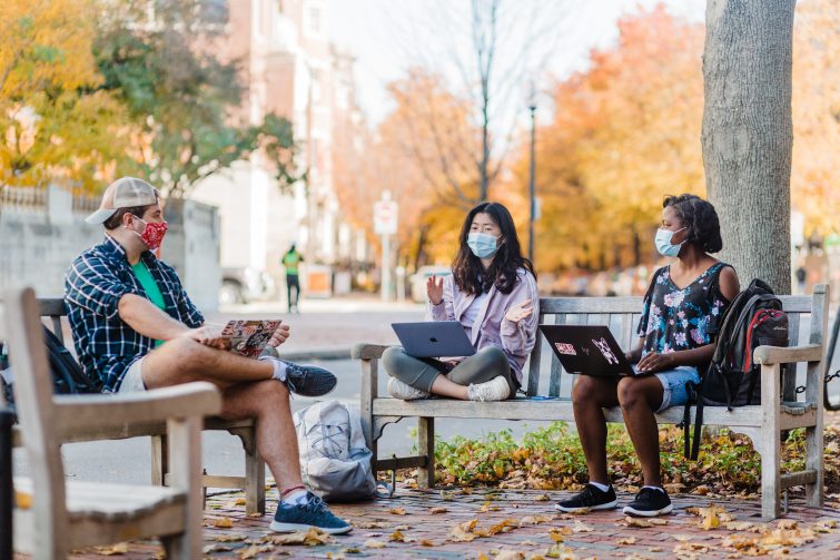 Students on campus. Links to Undergraduate Admissions page